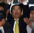 2008年11月11日，陈水扁被上手铐，他高举双手，大喊「政治迫害、台湾加油」。（本报系资料照片） - 中时电子报